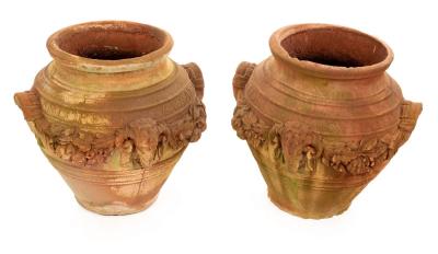 A pair of terracotta finish garden urns,