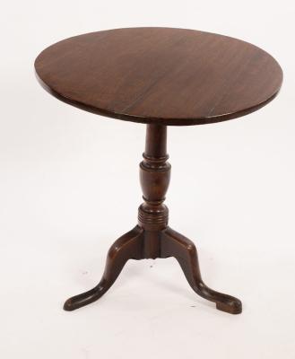 A 19th Century oak table on a turned 2db585