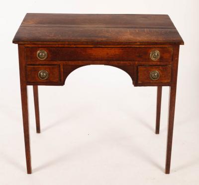 A late 18th Century oak tea table,