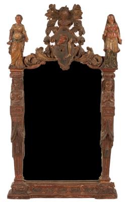 A carved wood painted and decorated