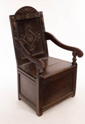A 17th Century oak wainscot chair with