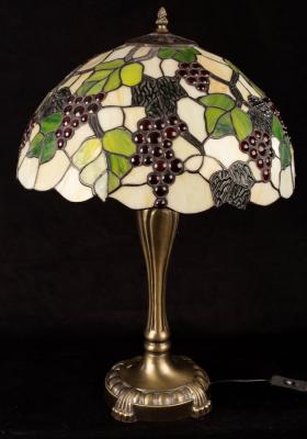 A Tiffany type table lamp, the shade