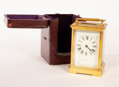 A gilt brass eight-day carriage clock,