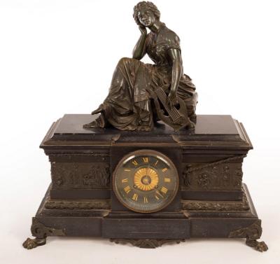 A 19th Century black slate clock