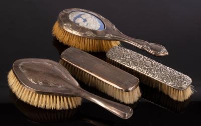 A silver mounted dressing brush with