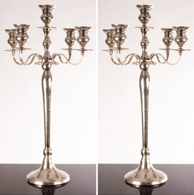 A pair of plated four-branch candelabra,