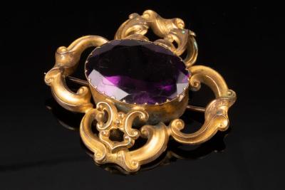 A Victorian amethyst brooch, the