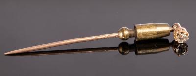 A diamond stick pin, the claw set