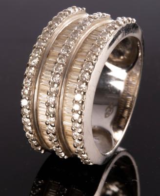 A modern diamond half hoop ring,