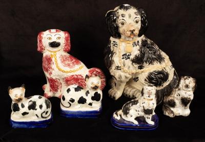 Four Staffordshire figures of seated