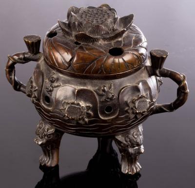 A Chinese bronze censer with embossed 2db873