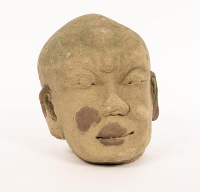 A Chinese carved stone head, Yuan dynasty,