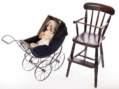 A Limoges doll with highchair and pram