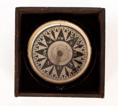 A ships compass, boxed, the dial 16cm