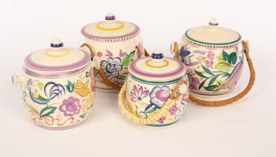 Poole Pottery, four floral biscuit