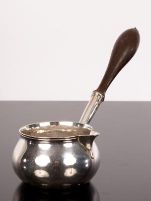 A George II silver brandy warmer,