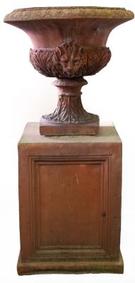 A terracotta campana-shaped vase