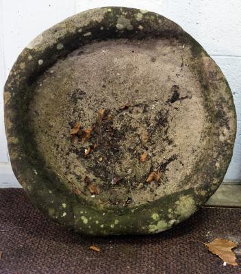 A circular stone trough 67cm diameter 2dbad1