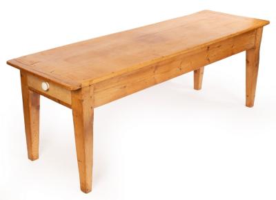 A rectangular pine table with a