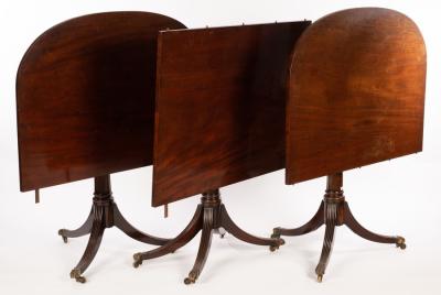 A mahogany two-pillar dining table,