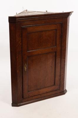 A 19th Century oak corner cupboard