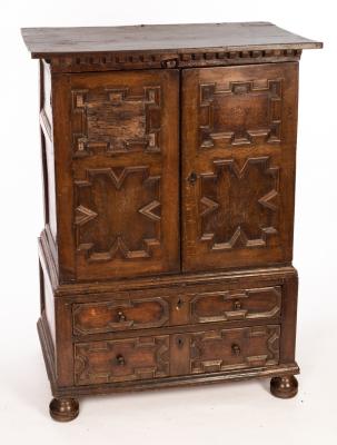 An 18th Century oak cupboard, the