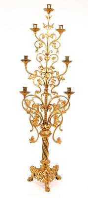 A gilt metal candle stand, with six-branches