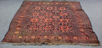 A Turkoman rug with red ground