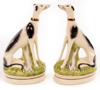 A pair of Staffordshire greyhounds each