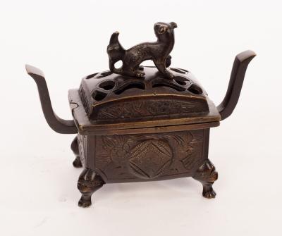 A Japanese bronze incense burner with