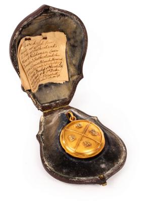 A Victorian gold locket inscribed 2dbca6
