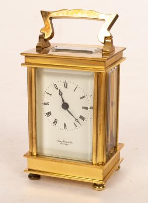 A miniature gilt brass carriage clock,