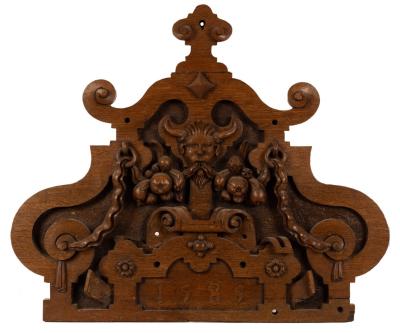 An Elizabeth I style carved oak