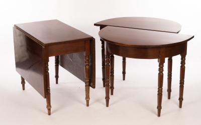 A mahogany dining table with two D ends