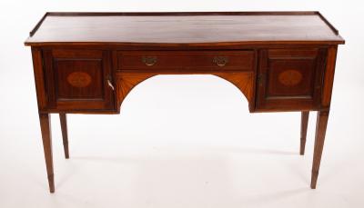 An Edwardian mahogany sideboard, inlaid