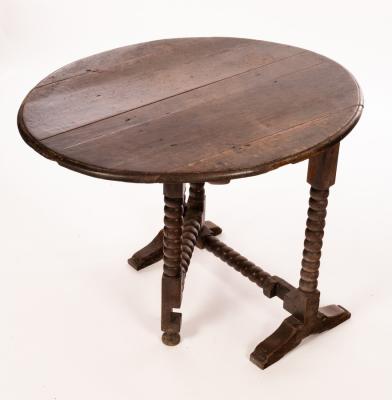 A Charles II oak coaching table,