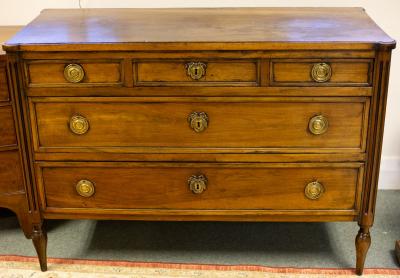 A French provincial walnut commode,