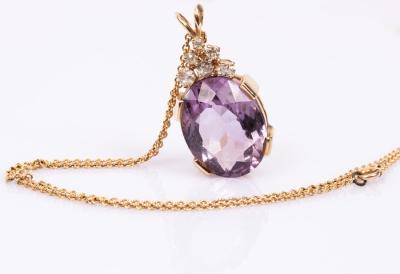 An amethyst and diamond pendant,