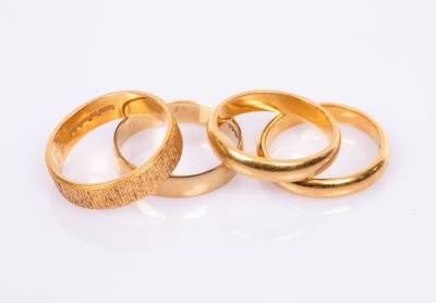 A textured 22ct yellow gold wedding