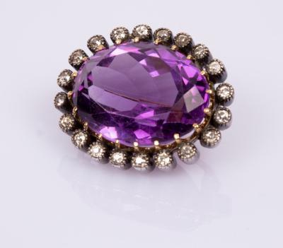 An amethyst and diamond brooch, the