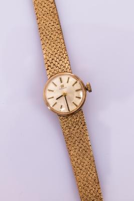 A lady's gold cased Tissot wristwatch,