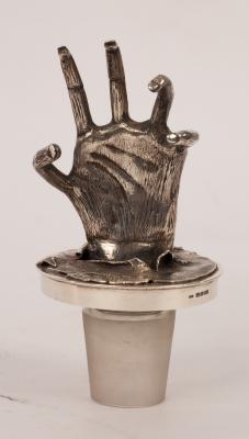 A silver decanter stopper, LCC, London,