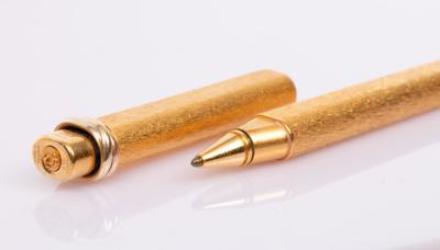 A gold plated pen by Le Must de Cartier,