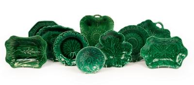 Eight Wedgwood green ground leaf plates