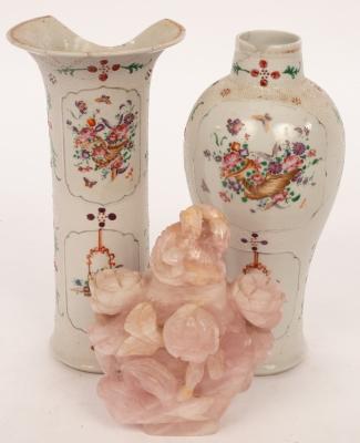A pink quartz vase decorated flowers