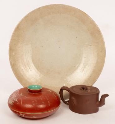 A Chinese Qing dynasty red ground dish
