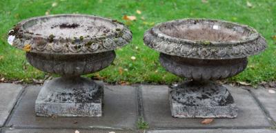 A pair of squat reconstituted stone