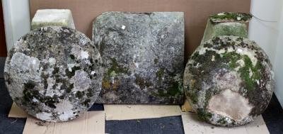 A pair of staddle stones and tops,