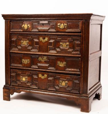 A 17th Century oak chest with plain