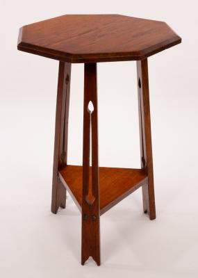 An Arts Crafts style oak occasional 2dc062
